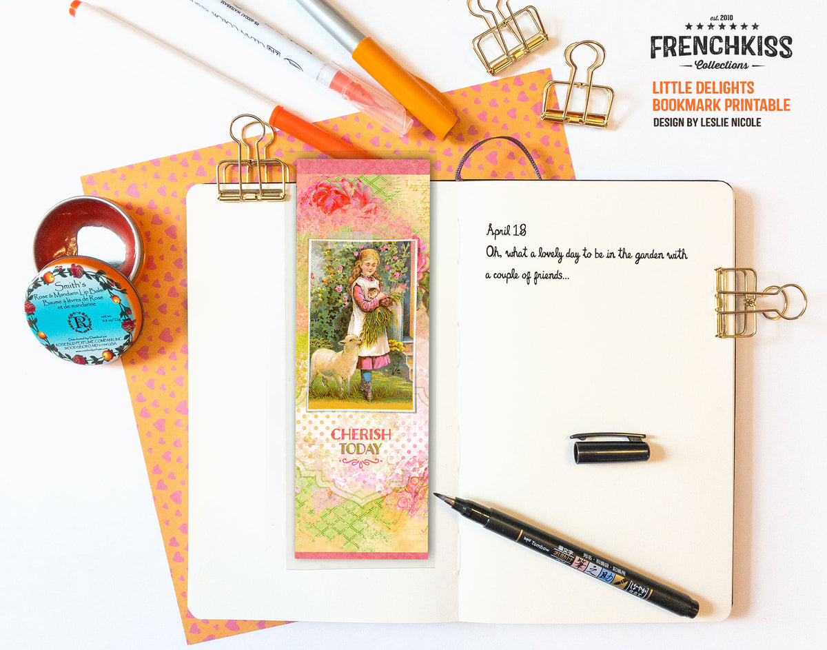Little delights bookmark printable shown with a journal.