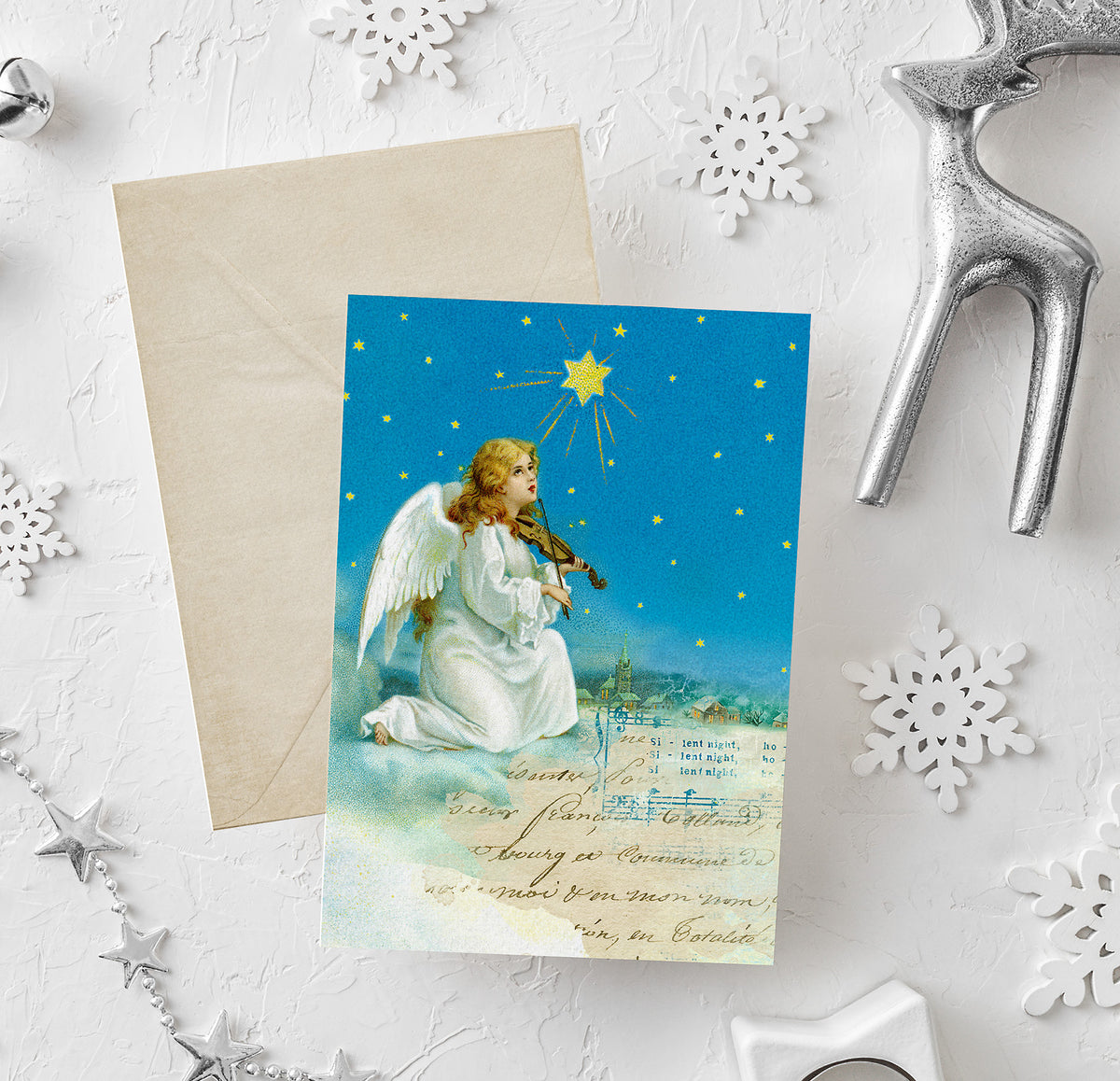 Angle Christmas Card design with vintage illustration graphics.